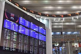 La Bourse de Tokyo en hausse portée par la signature du plan de relance américain